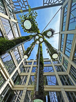 Colonnes Symbiose at Mutualité Française, empty metal tubes transmitting the light to the ground, Paris