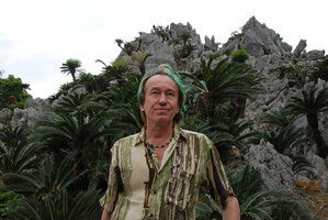 Patrick Blanc in front of a Cycas revoluta population on limestone cliff, Okinawa, Japan, April 2012