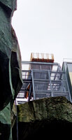 Green rocks and wooden terrasse overhanging the stairs, DWS Gaston Rebuffat, Paris