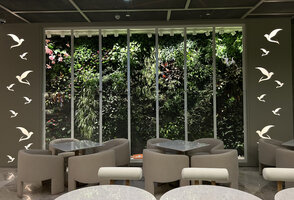 Matthew Kenney restaurant at Printemps Doha, Vertical Garden and aviary by Patrick Blanc