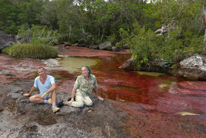 Pasca Heni and Patrick Blanc on slabs above a dense population of the deep red Macarenia clavigera, Cano Cristales, Meta, Colombia, Oct. 2016