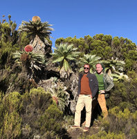 Pascal Heni and Patrick Blanc in front of the huge flower heads of Echinops longisetus, base of Sanetti Plateau, Bale NP, Ethiopia, Jan. 2019