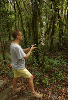 Pascal Heni smoking and filming Dendrobium devonianum in full bloom, in celebration of Patrick Blanc&#039;s Birthday on June 3rd, 2016, Phu Rua NP, Thailand