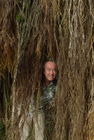 Patrick Blanc among the roots of a Ficus growing on a limestone cliff, Payakumbuh, West Sumatra, Dec. 2016