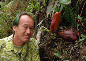 Patrick Blanc and an old Nepenthes rajah pitcher, Mt Kinabalu, Borneo, July 2010
