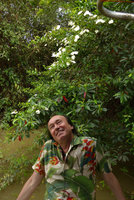 Patrick Blanc and the riparian Mussaenda aestuarii in full bloom, Karawari, Sepik, Papua New Guinea, March 2016