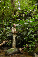 Patrick Blanc and a terrestrial Anthurium growing on seeping earth bank, Utria NP, Choco, Colombia, Nov. 2016
