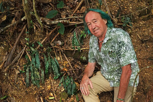 Patrick Blanc and Blechnum vieillardii with vertically hanging fronds close to the soil, Col des Roussettes, New Caledonia, Aug. 2023