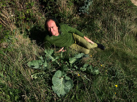 Patrick Blanc and Brassica oleracea above sea cliff, Etretat, Normandy, France, Sept. 2015