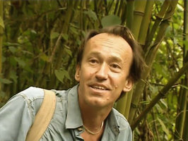 Patrick Blanc and Oldeania (syn. Arundinaria) alpina, Rwenzori Mt at 2800 m asl, Uganda, Feb. 1996