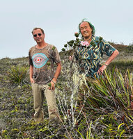 Patrick Blanc and Pascal Héni behind a pink form of Rhododendron asperum, Anggi Lakes, 2300 m asl, Arfak Mts, West Papua, May 2025                                         