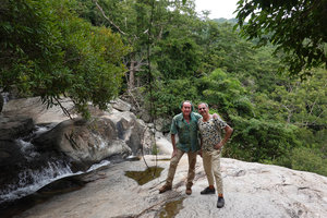 Patrick Blanc and Pascal Heni on slippery rock slab at the top of a waterfall, Nui Chua NP, Vietnam, Nov. 2019