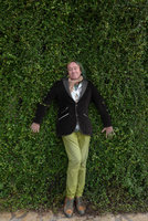 Patrick Blanc appressed against a wall covered by Muehlenbeckia complexa, Antibes, France, Nov 2015
