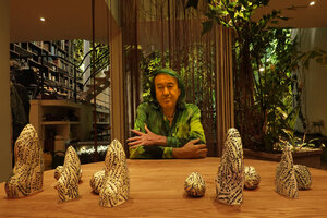 Patrick Blanc at home, checking his plant designs on the rocks for the new Dreamscape garden in Changi T 2