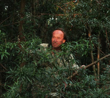 Patrick Blanc at sunset, partly hidden by Podocarpus neriifolius in the man made Wanagama forest, Gunung Kidul, Java, May 2018