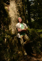 Patrick Blanc at the base of a Nothofagus menziesii trunk,, Mount Cook, New Zealand