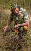 Patrick Blanc behind a tufted Caralluma adscendens with multiple brown stems, Chinnar WS, Kerala, India, Jan. 2023