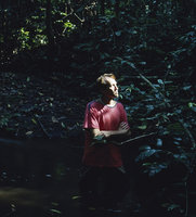 Patrick Blanc emerging from a forest stream, Campo, Cameroun, Sept. 1991