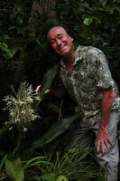 Patrick Blanc happy in front of Dracaena pethera (syn. Sansevieria kirkii) in full bloom, Kimboza FR, Uluguru Mts, Tanzania, Jan. 2021