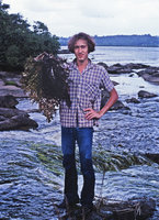 Patrick Blanc holding a specimen of Mourera fluviatilis in the rapids habitat, Saint Georges, French Guyana, March 1978