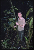 Patrick Blanc holding the stem of a Piper, Saul, French Guyana, Feb. 1985