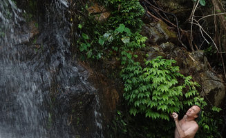 Patrick Blanc in a waterfall under an Elatostema population, Si Phang Nga NP, Thailand, Jan 2015