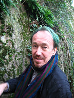 Patrick Blanc in front of a limestone cliff covered by saxicolous plants, Dol de Bretagne, France, Feb 2006