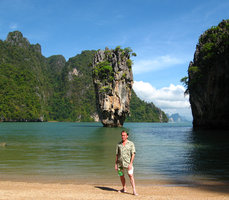 Patrick Blanc in front of the famous Ko Tapu, covered by many saxicolous trees growing in the karst interstices, Phang Nga, Thailand Dec 2005