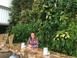 Patrick Blanc in front of the outdoor Juvia restaurant Vertical Garden, Miami Beach, Florida, July 2016