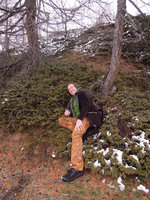 Patrick Blanc laying on a steep slope carpeted by Juniperus communis var. saxatilis, Grisons, Switzerland, May 2016