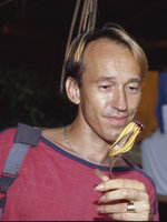 Patrick Blanc looking at a Pararistolochia (= Aristolochia) flower, Campo, Cameroon, 1991