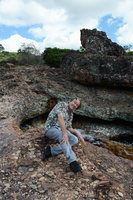 Patrick Blanc lying on a stony conglomerate, Chapada Diamantina, Brazil, July 2012