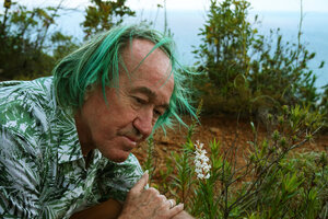 Patrick Blanc observing the flowers of Dracophyllum ramosum, Mont Dore, New Caledonia, Aug. 2023