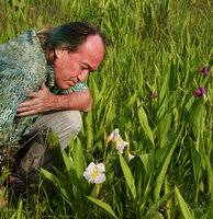 Patrick Blanc observing the white flower form of Siphonochilus kirkii, Katavi NP, Tanzania, Jan. 2021