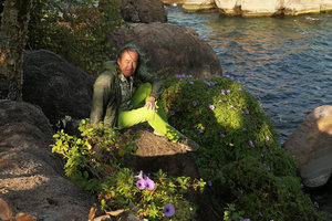 Patrick Blanc on big boulder among flowering Ipomoea cairica, Mumbo Island, Lake Malawi NP, Aug. 2017