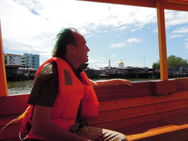 Patrick Blanc on boat along the river, Bandar Seri Begawan, Brunei, March 2012