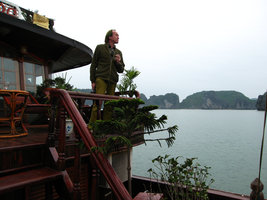 Patrick Blanc on boat at dusk, Halong Bay, Vietnam, Jan. 2007