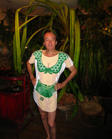 Patrick Blanc protected by Pandanus atrocarpus, trying a dress for a gift to Noemie Vialard, Creteil, France, Sept 2006