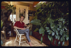 Patrick Blanc smoking at home among his depolluting plants, Paris, 1988