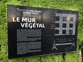 Patrick Blanc&#039;s Vertical Garden placard  relating his new botanical conception for the Quai Branly Jacques Chirac Museum, Paris, Dec. 2018