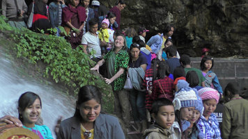 Patrick Blanc touching a rock covered by an Elatostema on Christmas day, Peik Chin Myaung cave, Pyin U Lwin, Myanmar, Dec. 2017