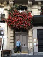 Patrick Blanc under a Pelargonium hybrid covering a huge surface due to the mild winter and perfect care of the owner, rue Damremont, Paris, May 2020