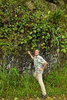 Patrick Blanc under a vegetative population of Pyrrosia abbreviata covering a vertical rock surface, Maninjau lake area, West Sumatra, Dec. 2016