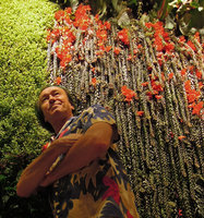 Patrick Blanc under the red flowering Columnea arguta, Sofitel Palm Jumeirah, Dubai