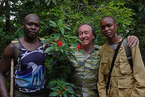 Patrick Blanc with his guides Yusto and Josiah around Rhodopentas bussei, Sanje waterfall, Udzungwa NP, Tanzania, Jan. 2021