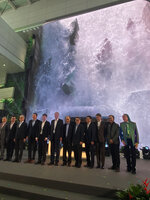 Patrick Blanc with the VIP guests at the inauguration of the T 2 expansion in front of the Wonderfall, the digital waterfall surrounded by plants, 1st Nov. 2023
