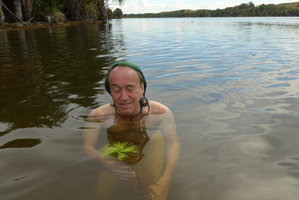 Patrick Blanc falling in love with the perfect spiral leaf arrangement of Eriocaulon melanocephalum, Lagos de Menegua, Puerto Lopez, Meta, Colombia, Oct. 2016