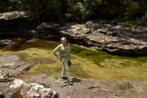 Patrick Blanc standing above a dense population of a Podostemaceae, either a very vigorous green form of  Macarenia clavigera or a new species, Cano Cristales, Serrania Macarena NP, Meta, Colombia, Oct. 2016