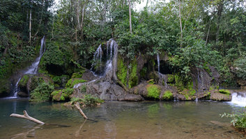 Waterfall with rock covered by green iridescent mosses, Bonito, Brazil